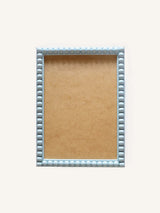 Powder blue lacquer bobbin frame, 6" x 8"