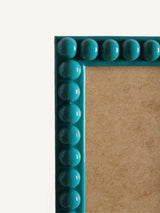 Teal lacquer bobbin frame, 6" x 8"