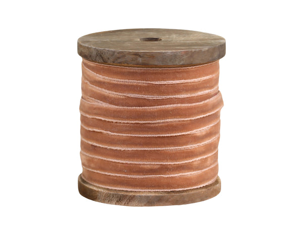 velvet ribbon on wooden spool