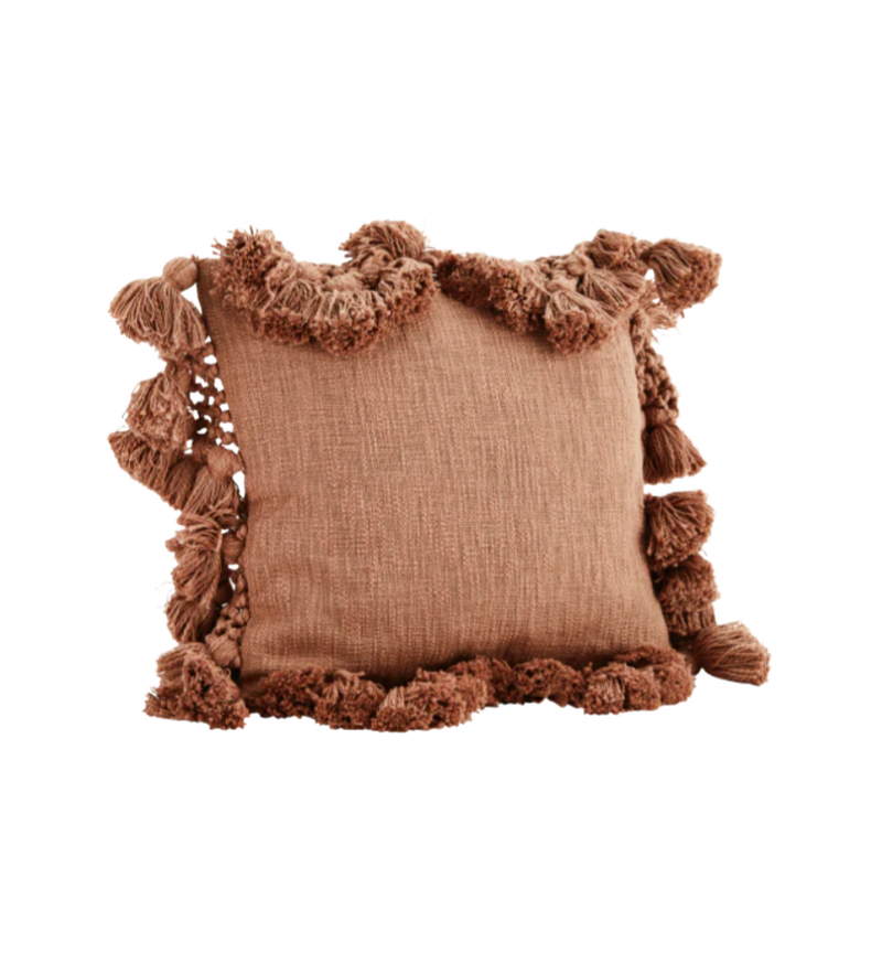 Cushion with tassels