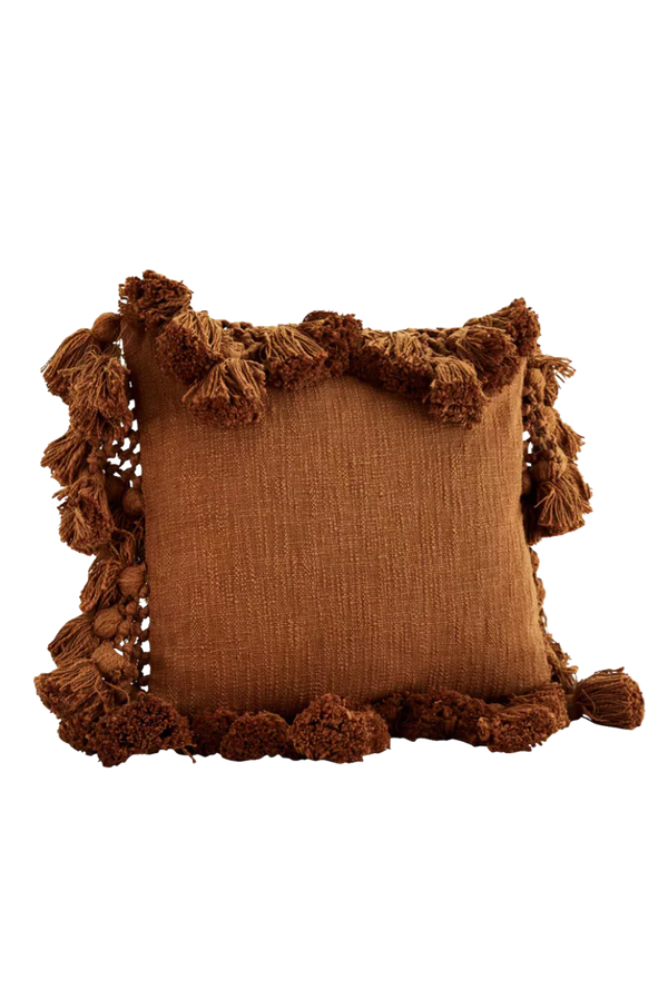 cushion with tassels, rust