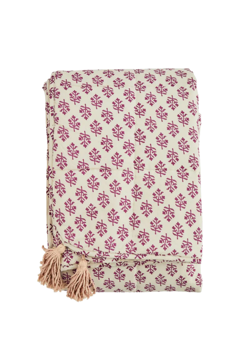 printed cotton quilt with tassels