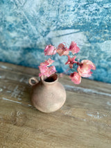 small terracotta vase with handle